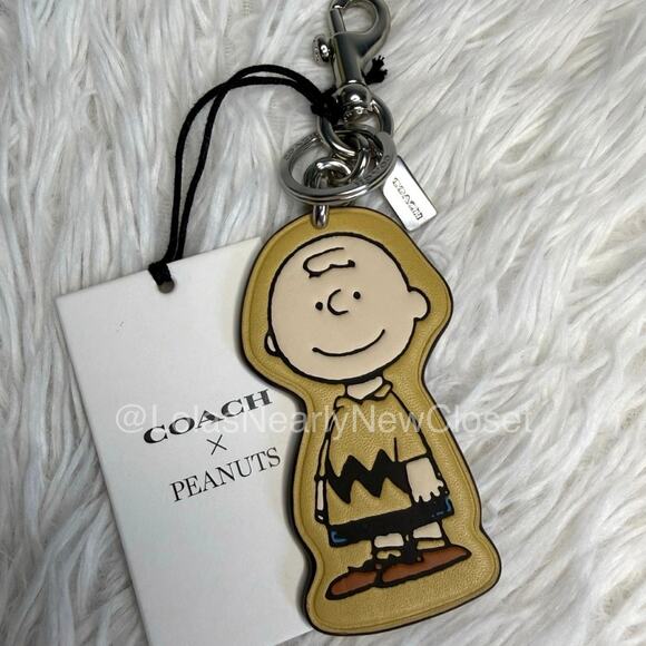 Coach Handbags - NWT Coach X Peanuts Charlie Brown Bag Charm